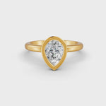 Load and play video in Gallery viewer, Pear Cut Real Moissanite Bezel Set Solitaire Ring 14K Gold Plated
